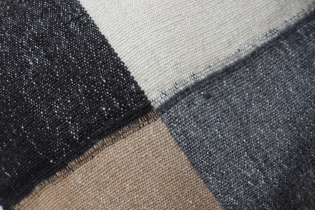 Close up of Traditional Unkuña Tawa Alpaca Table Runner in Black/Vicuña/Grey/White